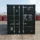 A shipping container with specifications, set against a backdrop of other containers at a dock.